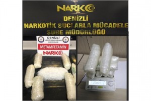 Otomobilin tavanından 2 kilo uyuşturucu çıktı