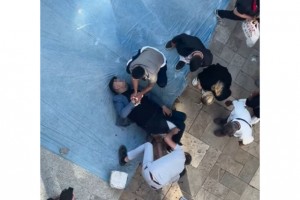 Kendisini silahla vuran şüpheliyi kovalayıp yere yıktı